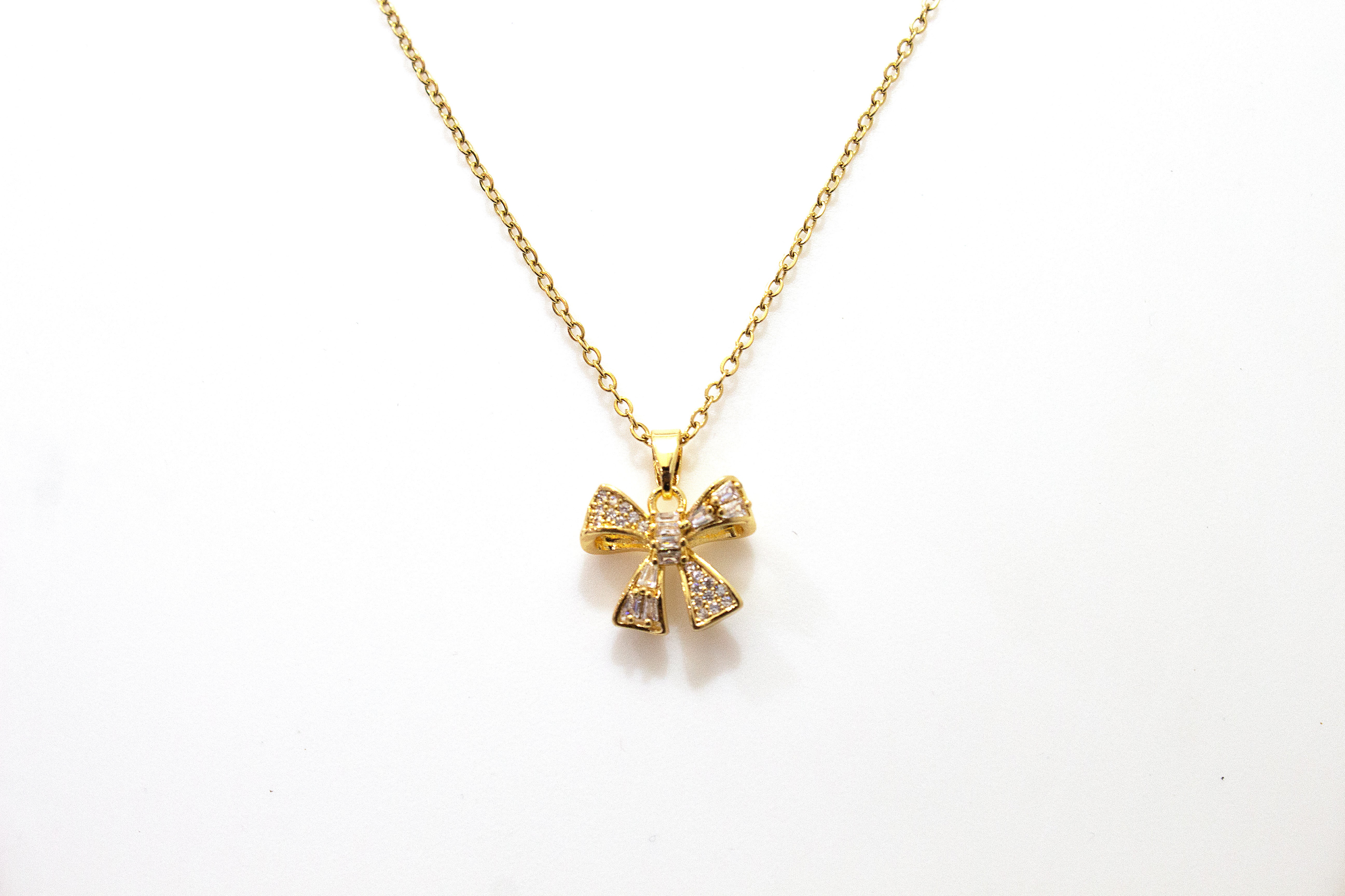 GLITTER BOW PENDANT NECKLACE