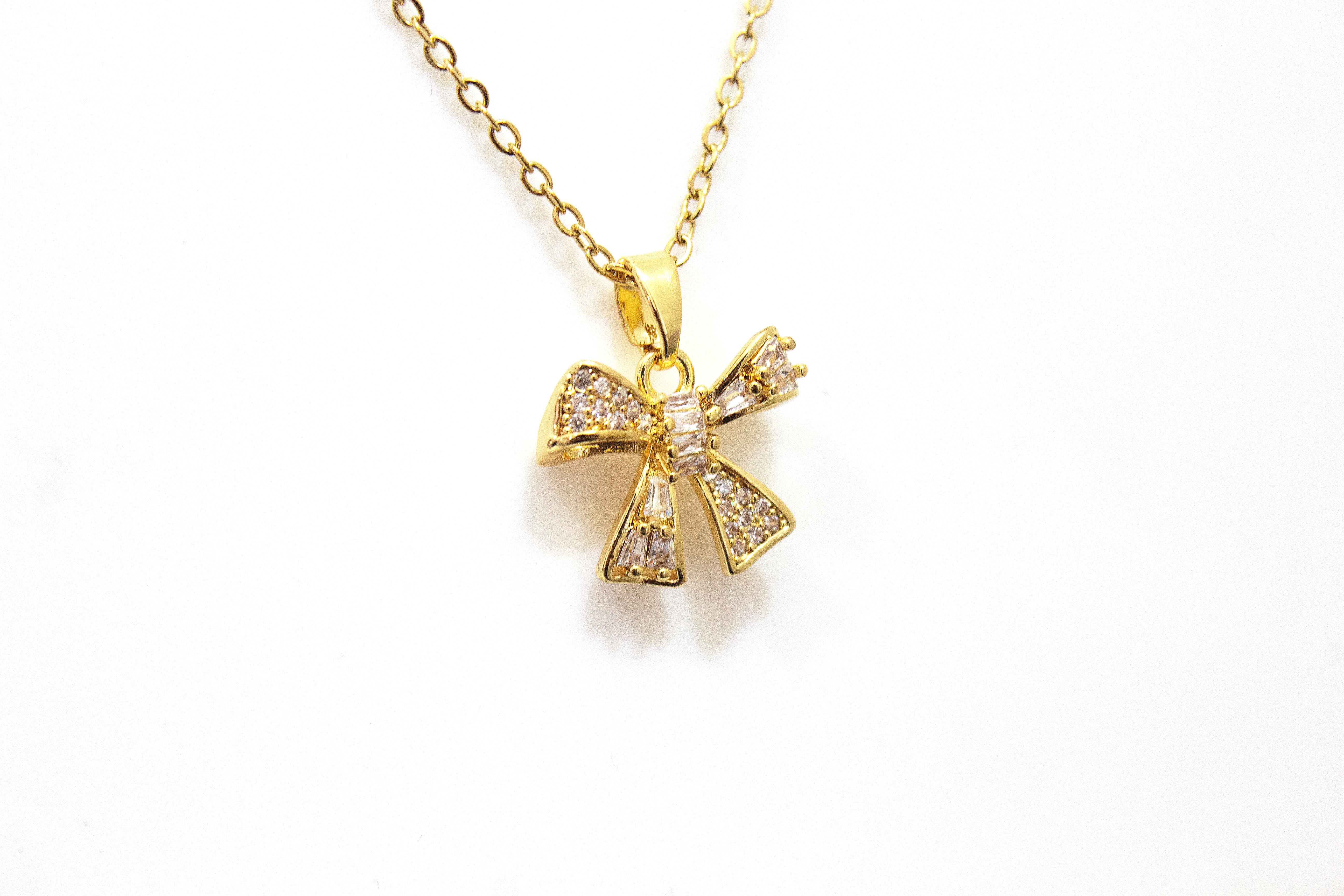 GLITTER BOW PENDANT NECKLACE