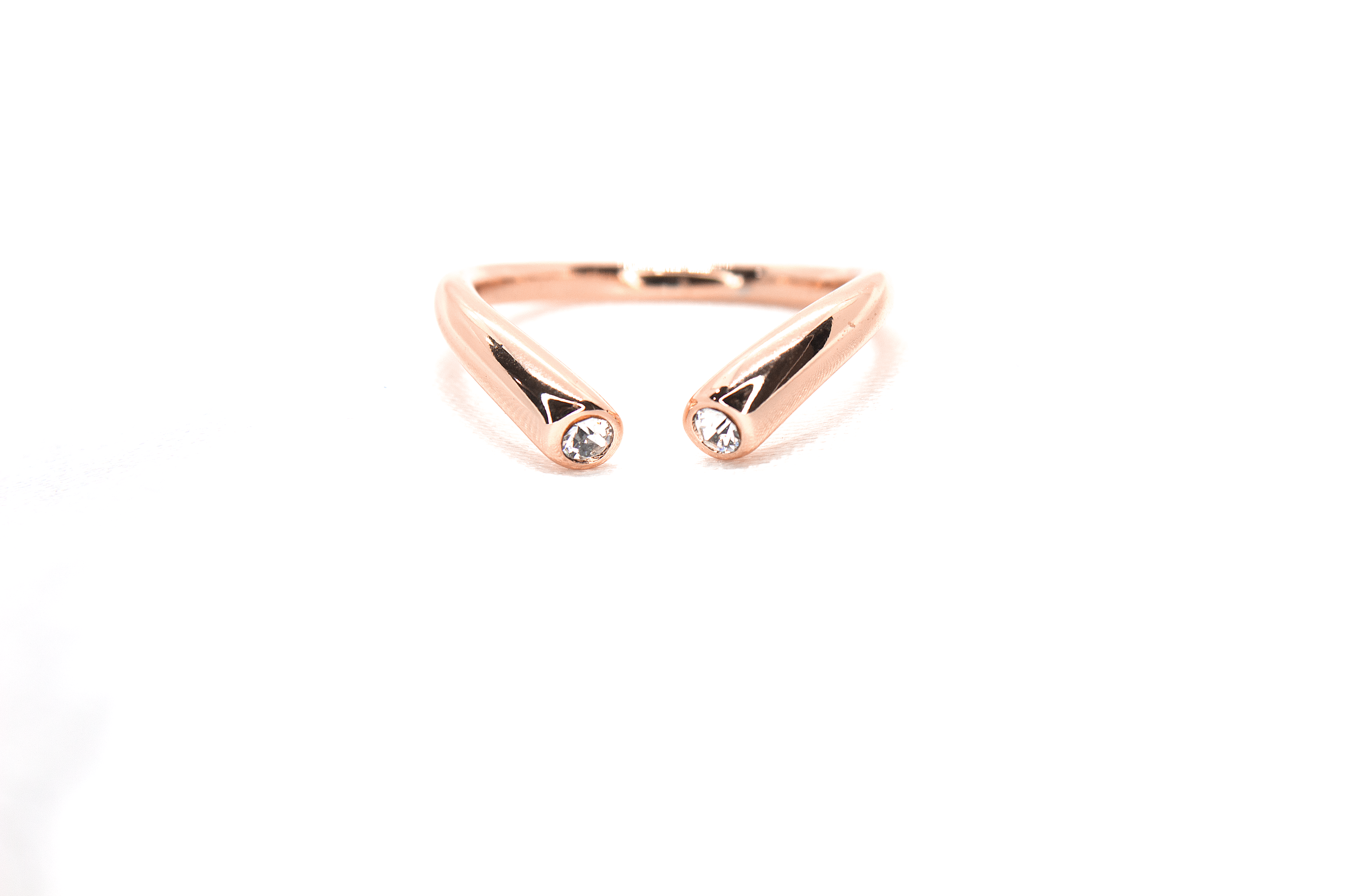 MODERN OPEN-BAND RING WITH BEZEL-SET STONES
