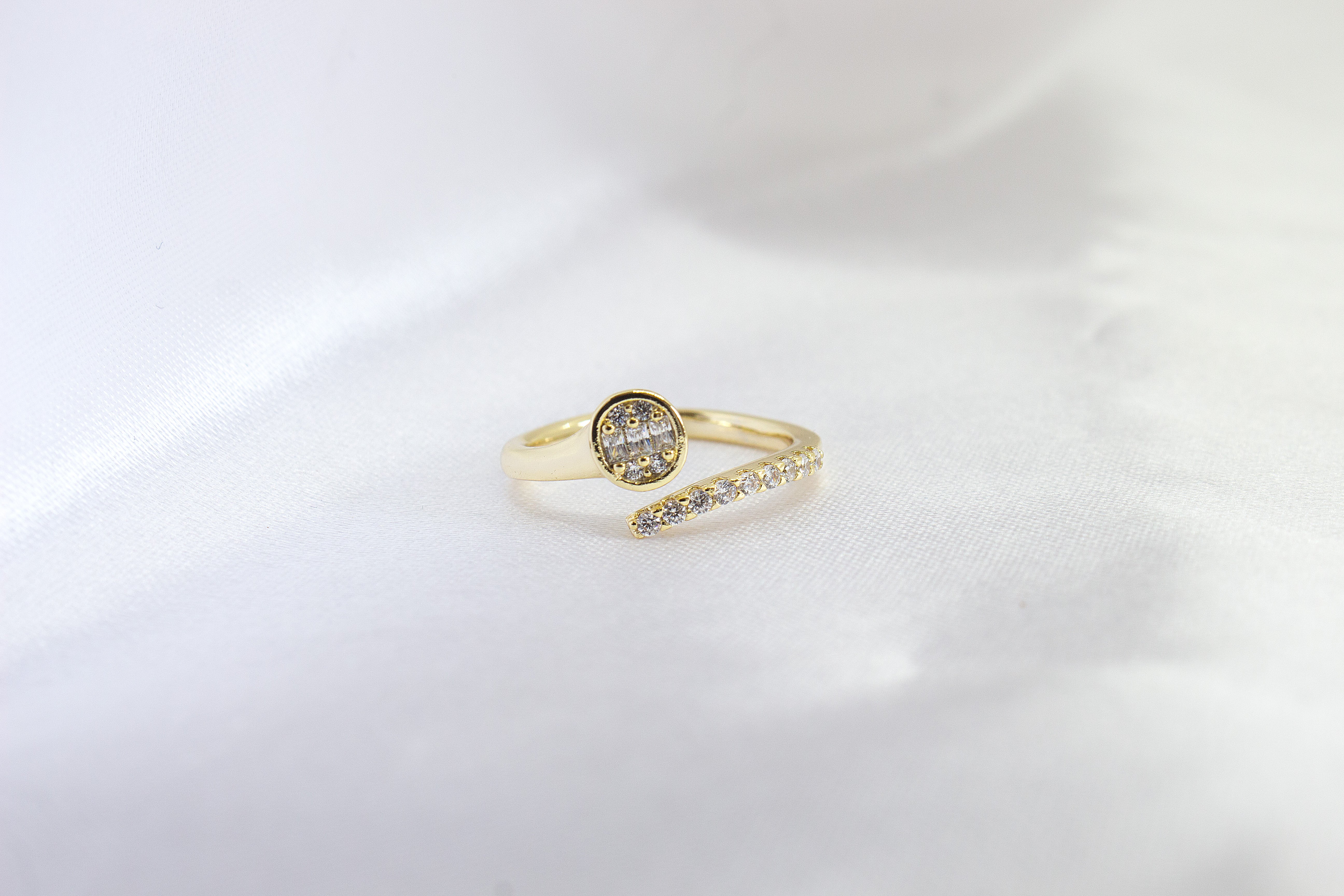 ASYMMETRIC HALO ZIRCON RING