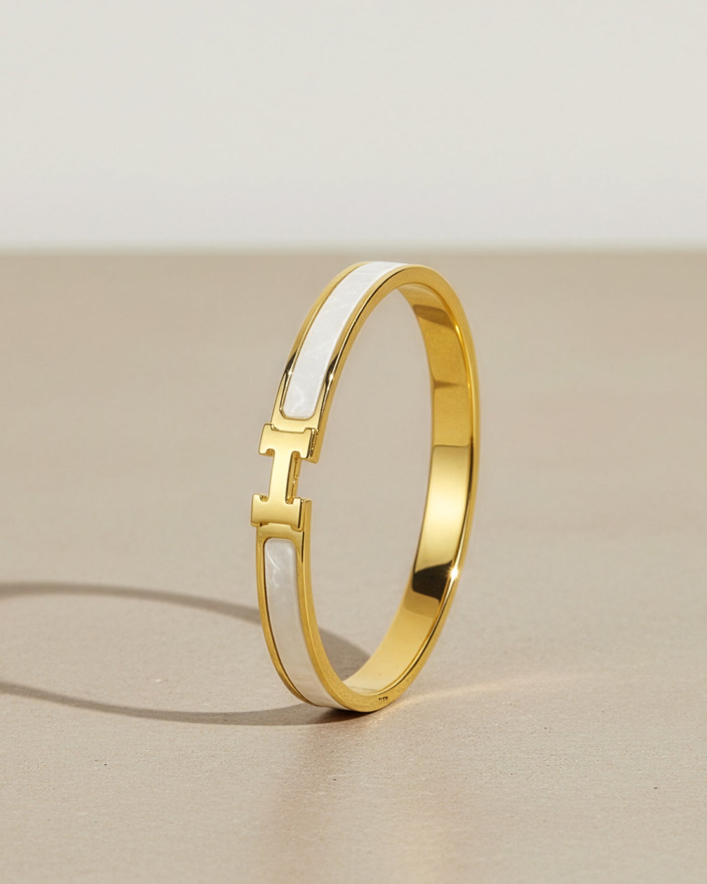 Gold H Design White Inlay Bracelet